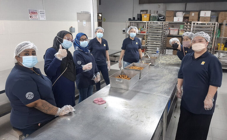 Packing with Purpose: Asian Tigers and Silk Relo Support Willing Hearts’ Mission in Singapore